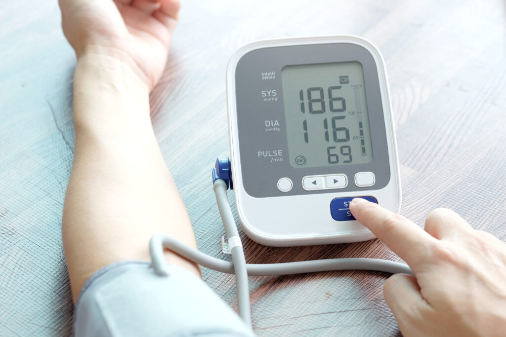 Man,Check,Blood,Pressure,Monitor,And,Heart,Rate,Monitor,With
